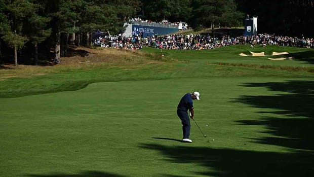 Ireland's Padraig Harrington plays a shot from the 13th fairway on day one of the 2023 BMW PGA Championship at Wentworth Golf Club.